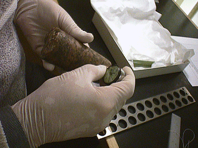 Figure 13 d. Inspecting the depth of the groove with depth gage